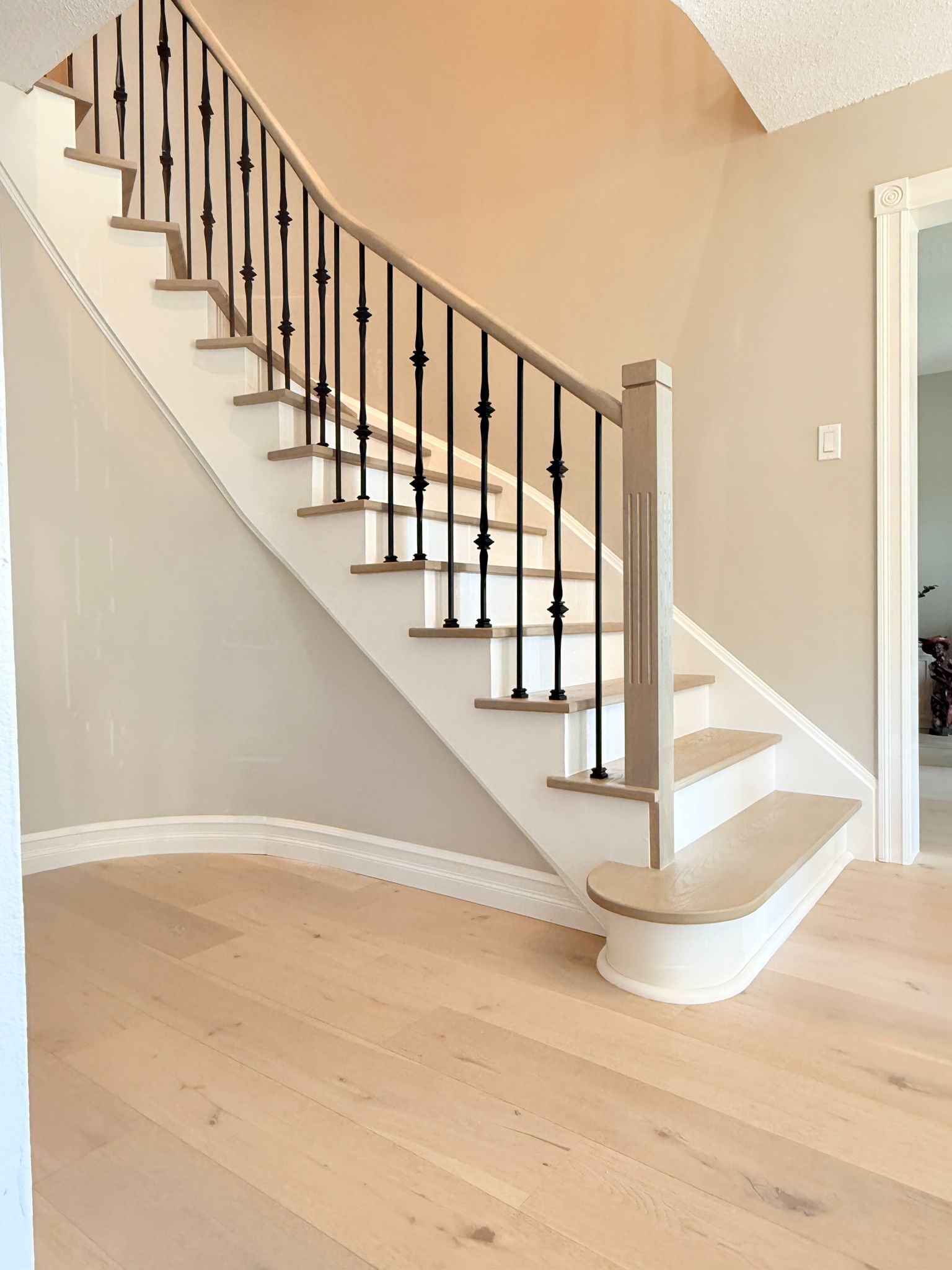 Curved Staircase Renovation by Simply Stairs
