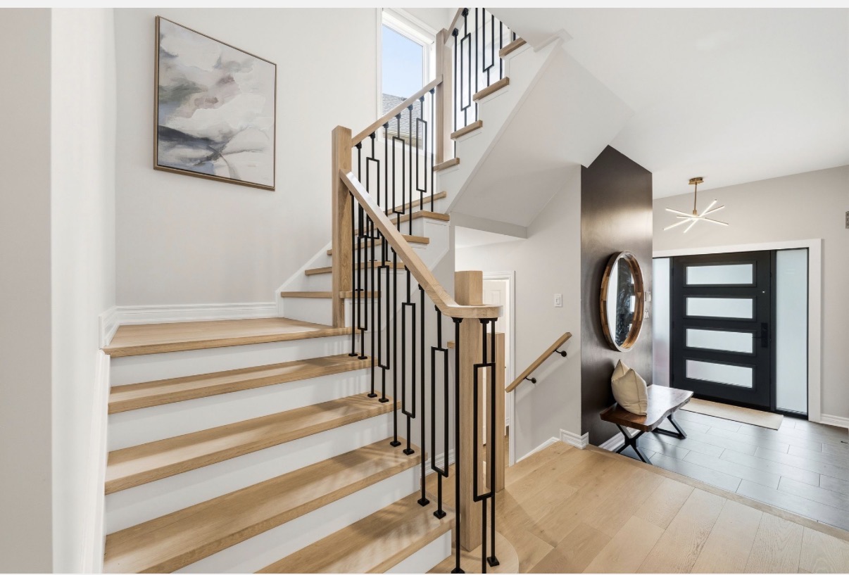 Oak & Black Iron Staircase by Simply Stairs